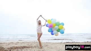 Italian MILF blondie plays with balloons