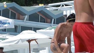 Young nudist showing her perfect natural breasts