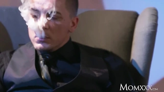 MILF in stockings and heels gives a cigar to a stallion with a gagging blowjob