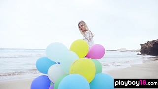 Sexy naked MILF playing with her baloons