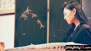 Chinese porcelain doll shows her pussy