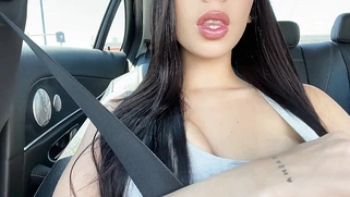 Busty Latina masturbates in a car before the finale