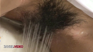 Seductive Asian Beauty Manami Komukai Sucks Dick Seductively in Bathtub Bliss