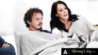 Reagan Foxx Gives Stepson a Sneaky Handjob Next to His Husband During Movie Night!