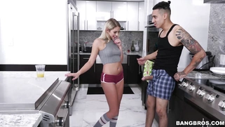 Blonde babe Khloe Kapri gives blowjob in the kitchen