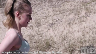 Blonde Masturbates On Beach