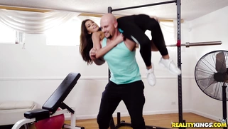 Olivia Lua does sport exercises with the trainer Jmac