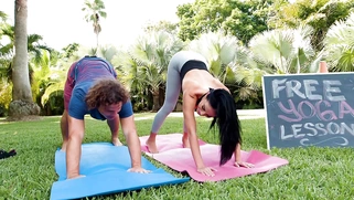 Latina Victoria June does yoga exercises outdoors