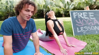 Latina Victoria June does yoga exercises outdoors