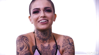 Leigh Raven shows off her split tongue and pierced tits