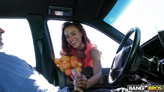 Ebony Demi Sutra is sucking the hard white cock in the car