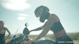 Busty bikers Anna Bell Peaks and Felicity Feline refreshing on the road