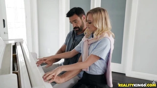 Kenzie Kai takes piano lessons from Charles Dera