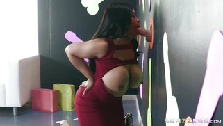 Big breasted Aryana Adin sucks cock through the glory hole