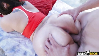 Alycia Starr lying on her stomach getting fucked outdoors