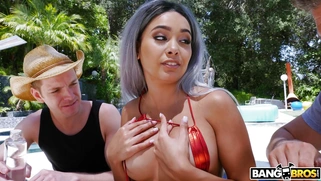 Aaliyah Hadid gets her body spreaded with oil poolside