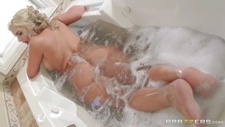 Phoenix Marie foaming her big ass and juicy tits in the bathtub