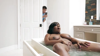Busty Layton Benton takes the bathtub and plays with her pussy