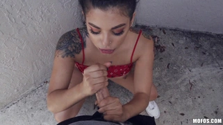 Tattooed Gina Valentina is sucking cock outdoors